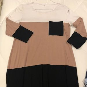 Dress or long flowy top to wear over leggings